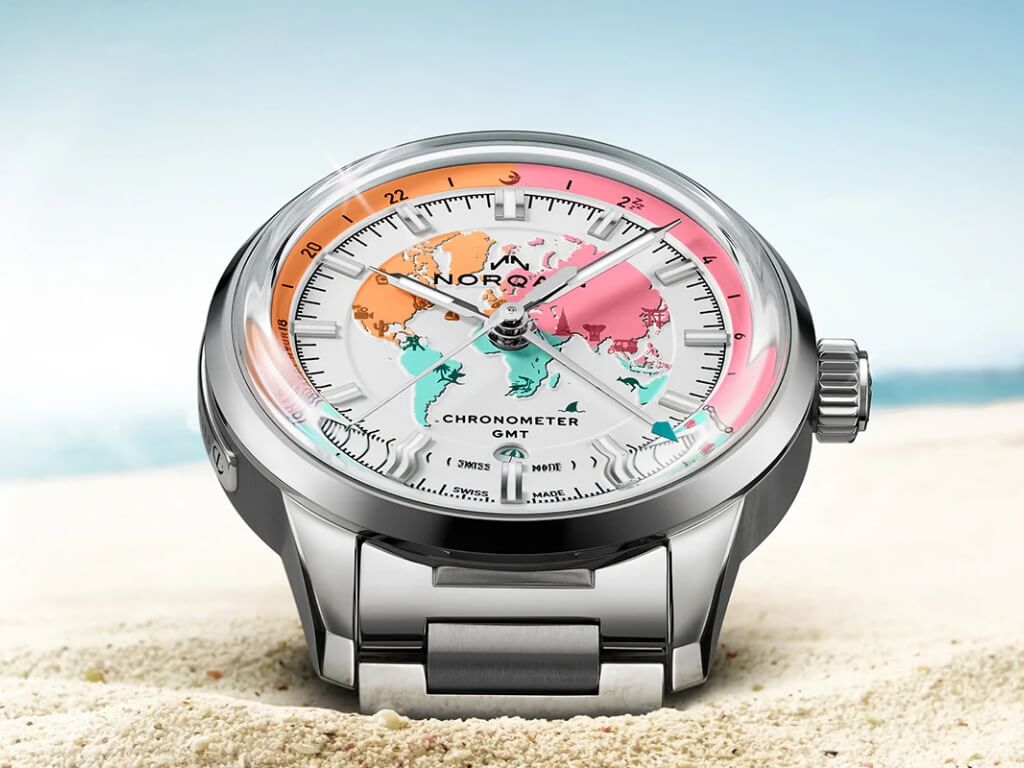 Λεπτομέρεια του καντράν του Norqain Freedom GMT Enjoy Life Holiday με τα Holiday Icons