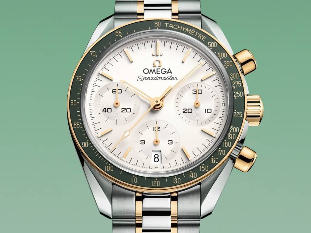 Δίχρωμο OMEGA Speedmaster 38 mm με πράσινη στεφάνη και χρυσούς συνδέσμους